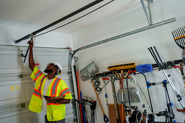 Professional Garage Door Panel Replacement technician working in Holton, KS